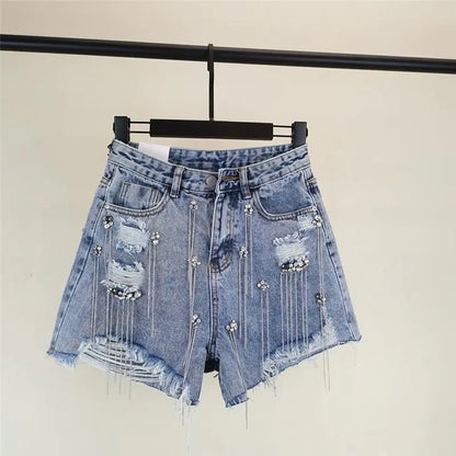 Glamouröse Jeansshorts mit Quasten und Strass