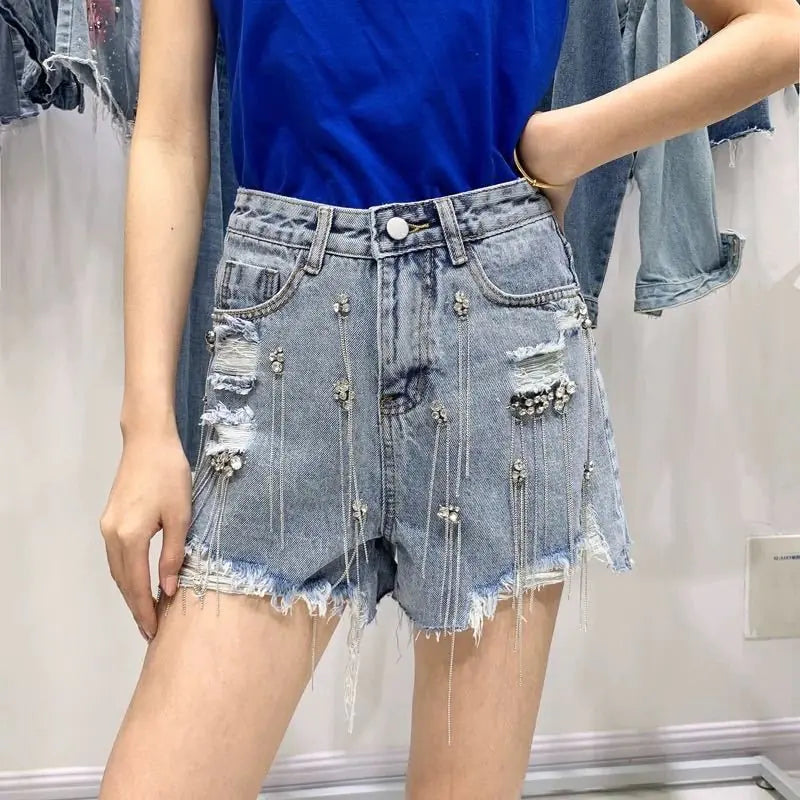 Glamouröse Jeansshorts mit Quasten und Strass